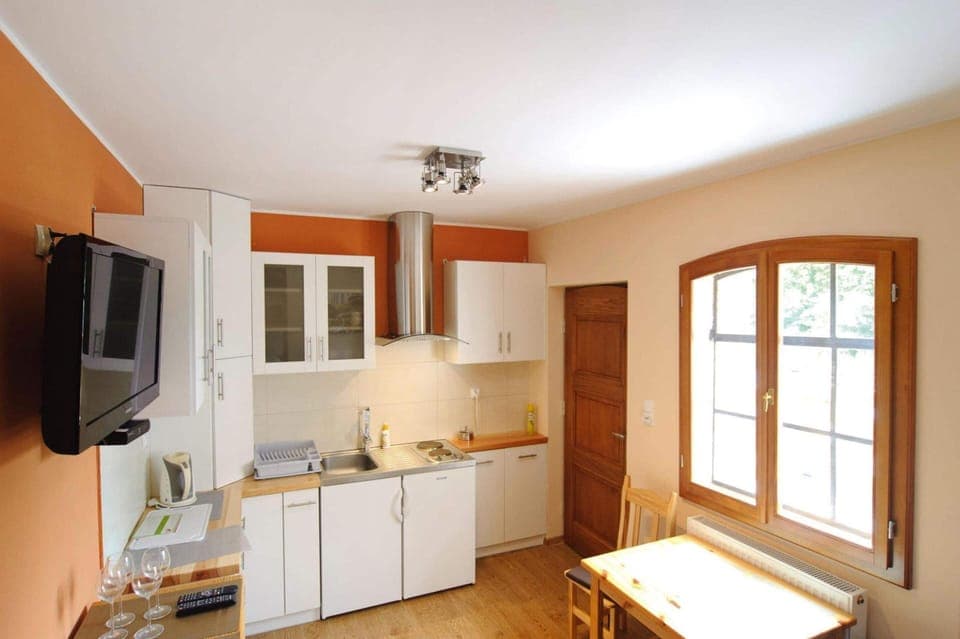 Apartment | Private kitchen | Electric kettle, highchair
