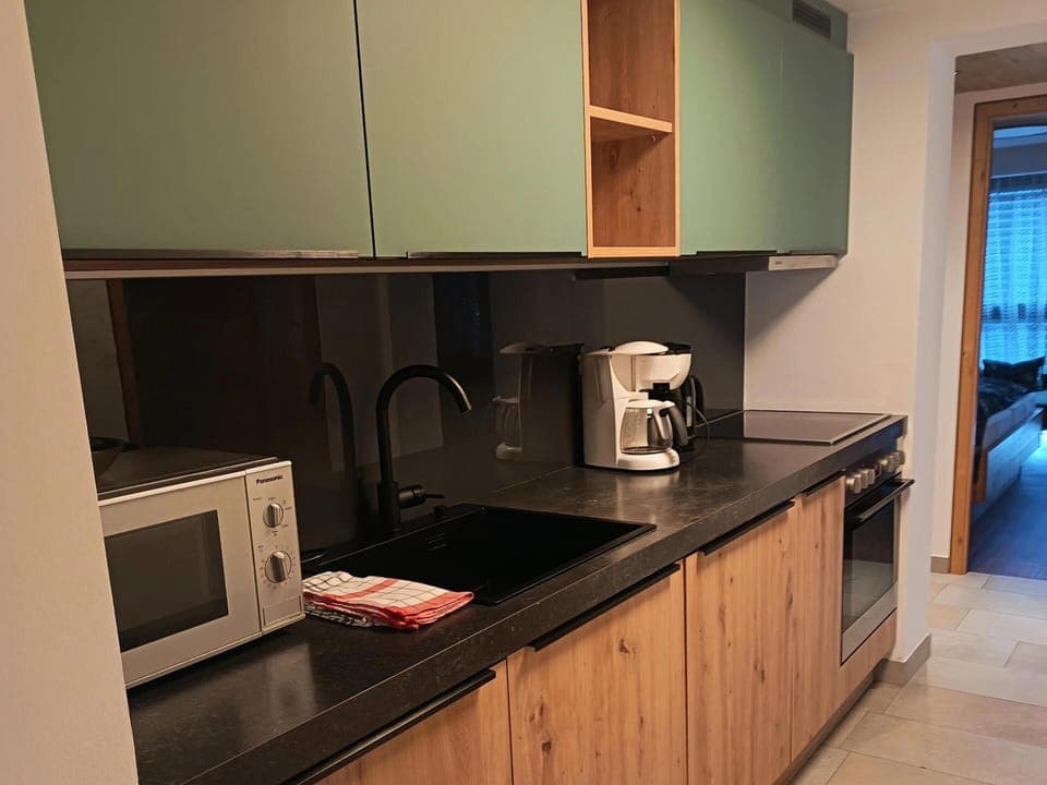 Apartment | Private kitchen | Electric kettle, toaster, highchair