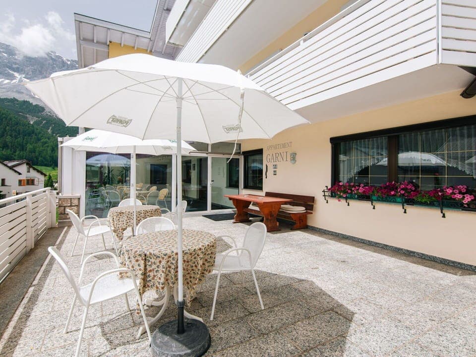 Property, Furniture, Building, Table, Plant, Flowerpot, Chair, Shade, Lighting, Outdoor Furniture