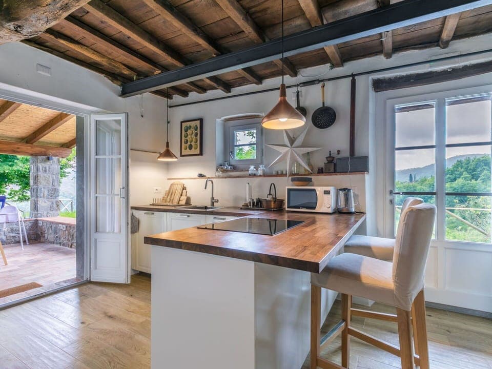 Furniture, Interior Design, Flooring, Kitchen, Countertop, Wood, Ceiling, Chair, Floor, Light Fixture