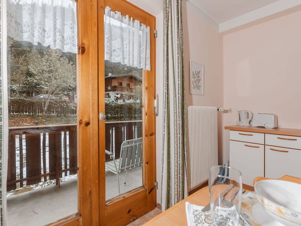 Furniture, Tableware, Table, Wood, Interior Design, Door, Chair, Cabinetry, Floor, Building