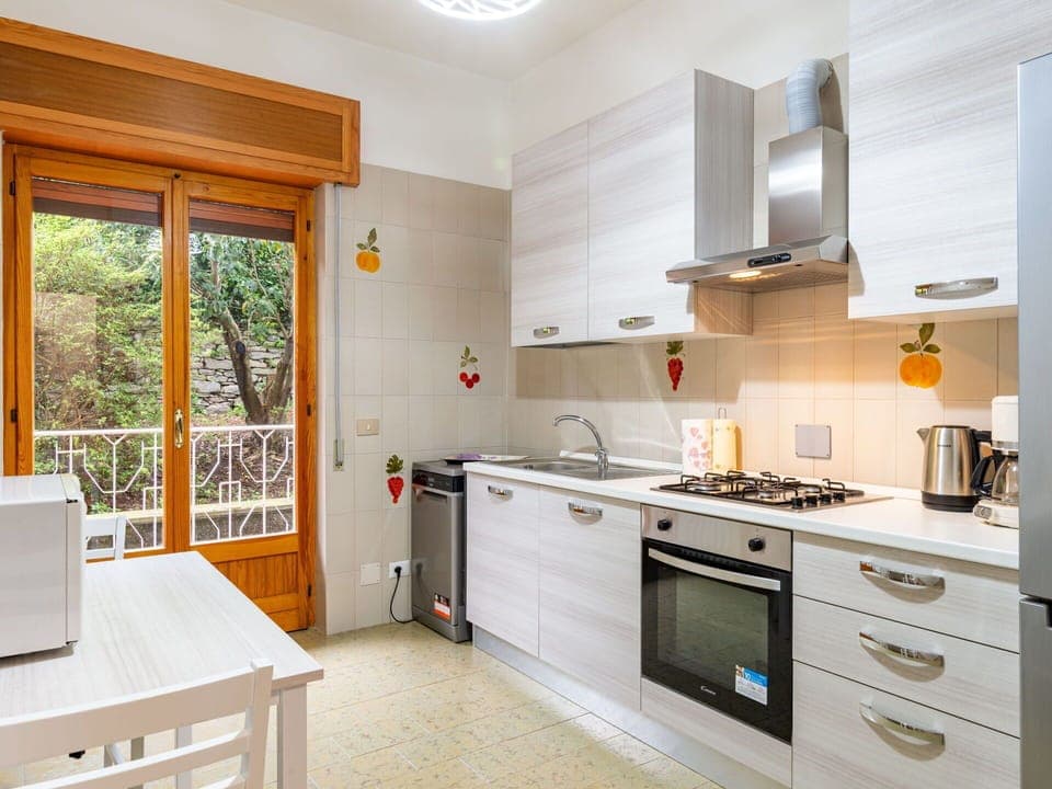 Cabinetry, Countertop, Property, Furniture, Kitchen Stove, Kitchen Appliance, Building, Window, Kitchen, Wood