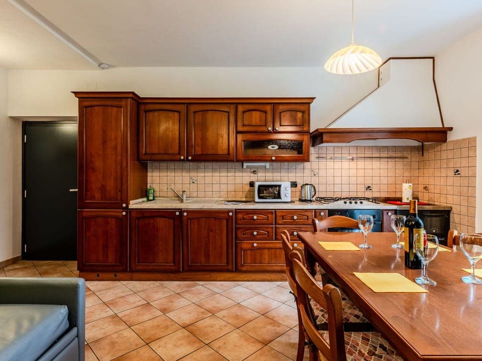 Interior Design, Wood, Flooring, Furniture, Ceiling, Kitchen, Floor, Countertop, Room, Cabinetry