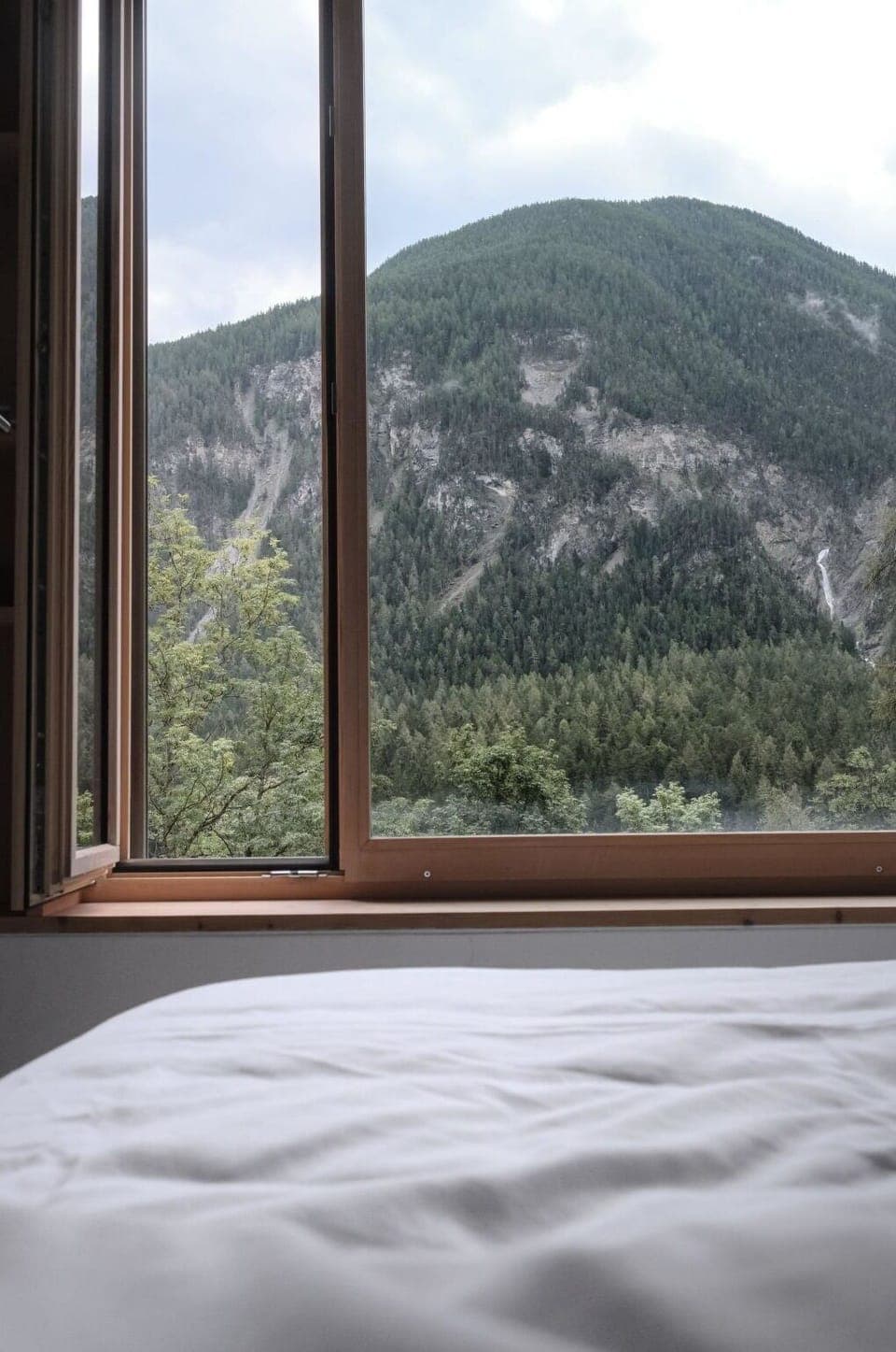 Sky, Cloud, Property, Window, Mountain, Wood, Building, Tree, Shade, Comfort