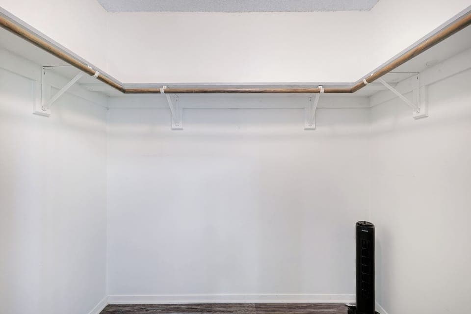 Spacious walk-in closet in the primary bedroom.