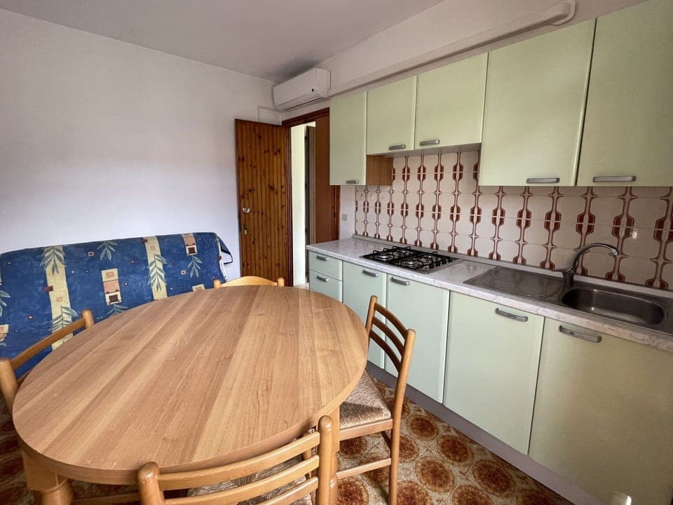 Furniture, Cabinetry, Property, Table, Countertop, Kitchen Stove, Wood, Sink, Lighting, Interior Design