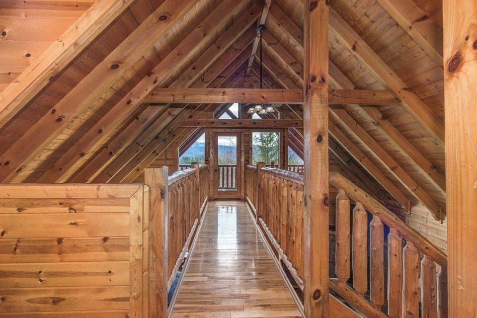 Gorgeous treetop views await at the end of the loft’s catwalk