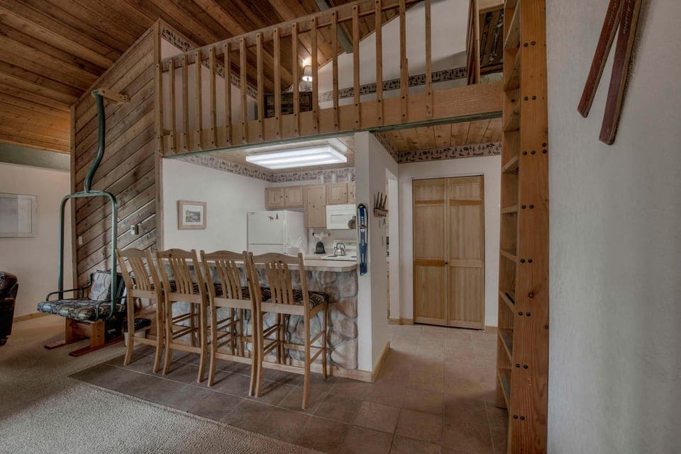 Kitchen with toaster, drip coffee maker, blender, slow cooker, and more