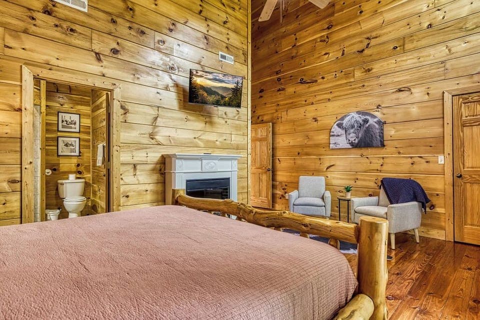 Upstairs King BR 2 w/ ensuite bath, electric fireplace, smart TV