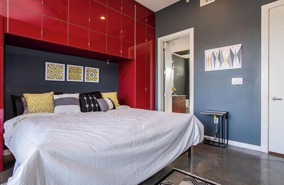 Bedroom with King bed, balcony, and en suite