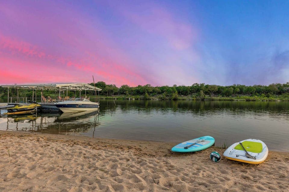Soak in the sunshine lakeside on your very own private beach
