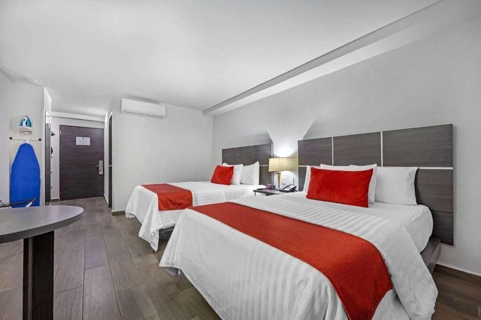 Room, 2 Queen Beds | In-room safe, desk, laptop workspace, iron/ironing board