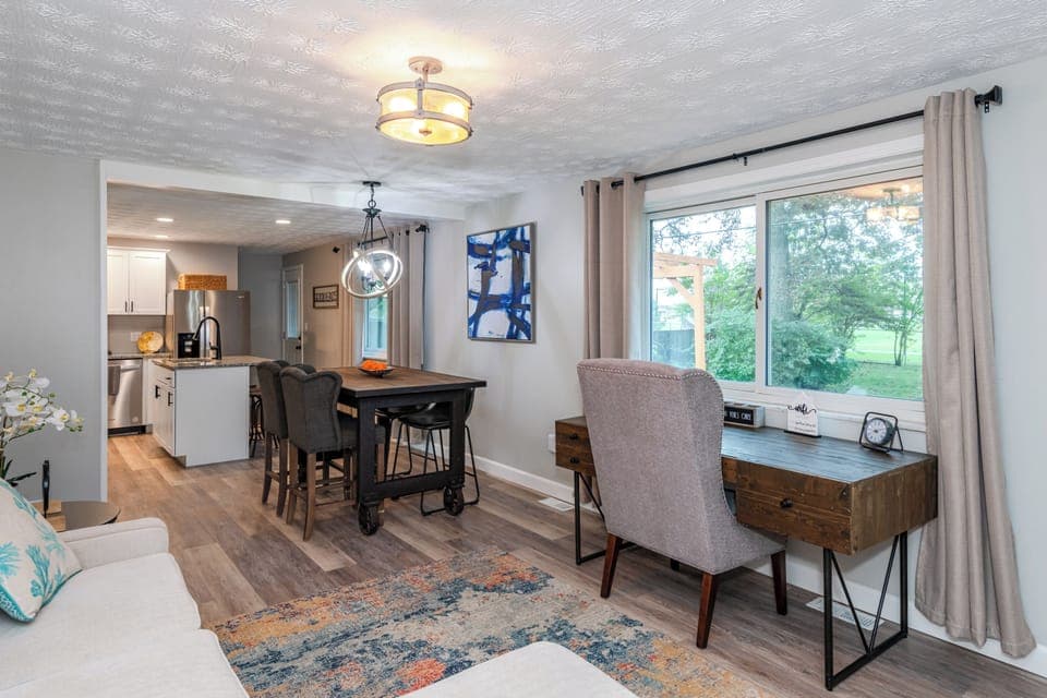 Located next to the kitchen, ensuring easy access to food and drinks.