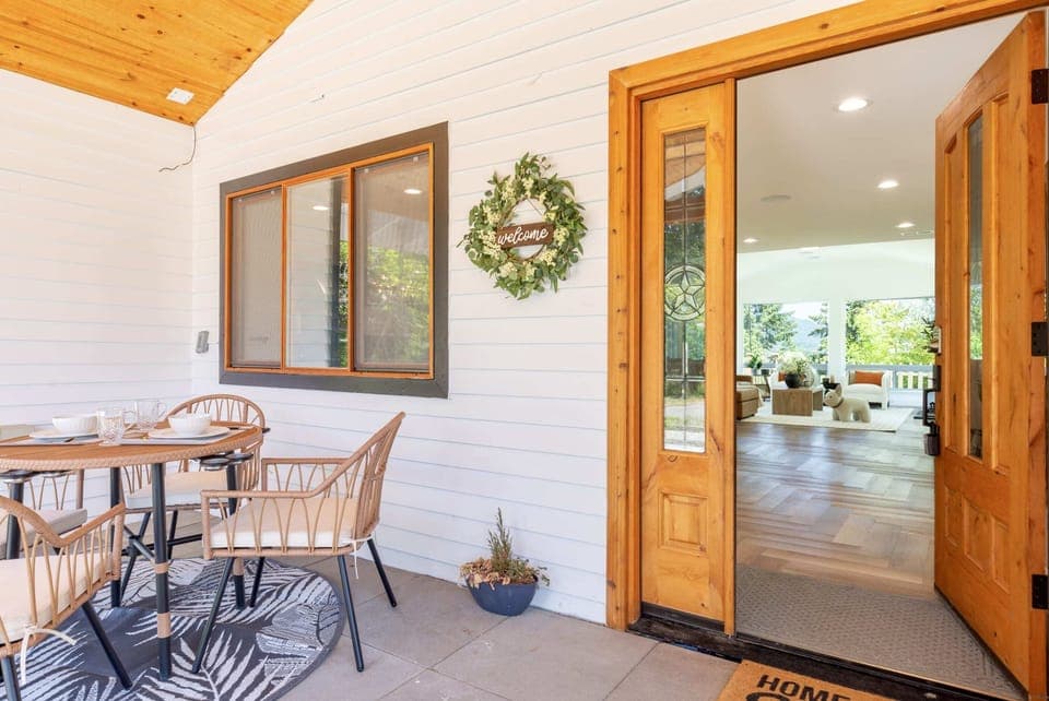 An inviting entrance awaits you, with a blend of rustic and modern elements for a warm welcome.