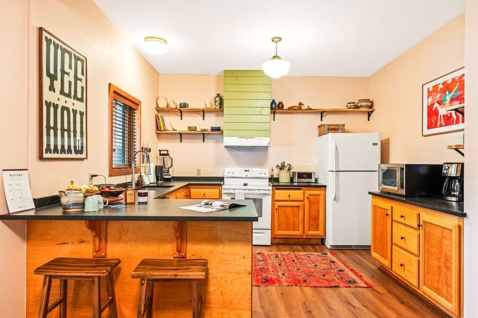 The open plan fully equipped kitchen