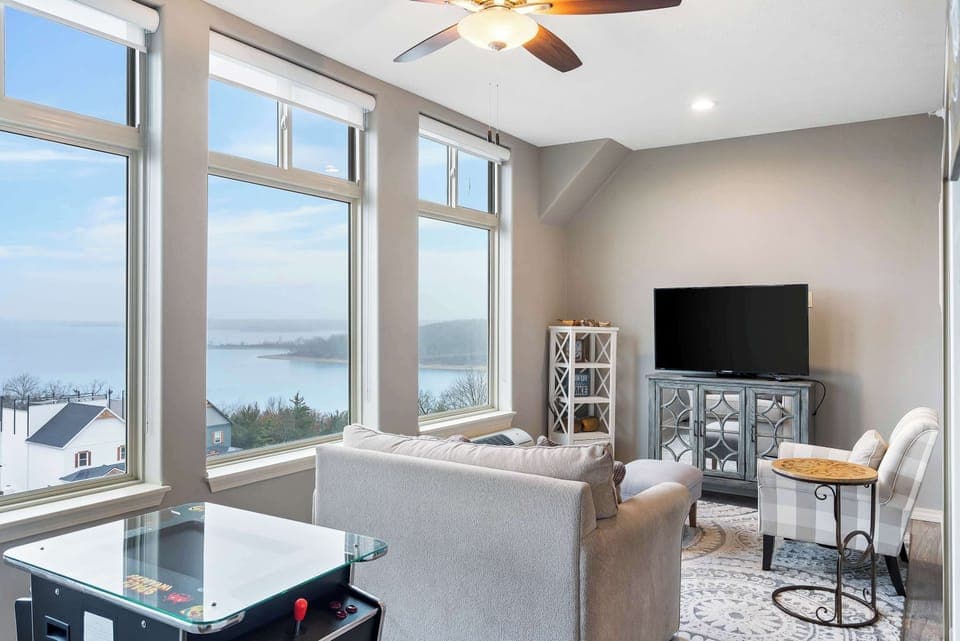 The sunroom offers a picturesque backdrop for enjoying movies & gaming