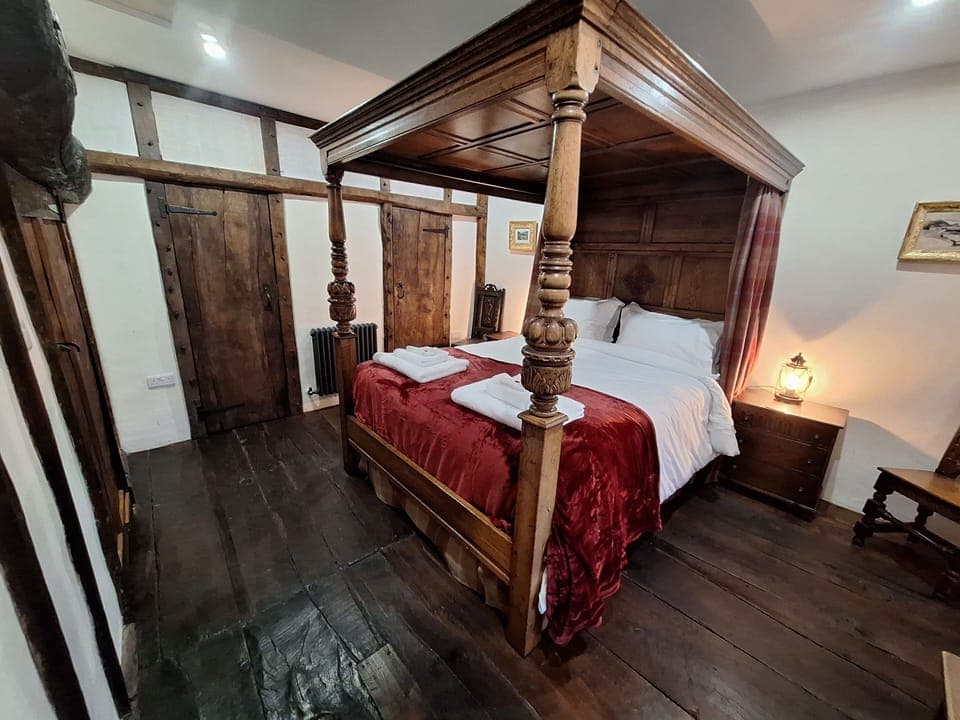 Master Bedroom original Oak Floor with Kingsize 4 Poster Bed.