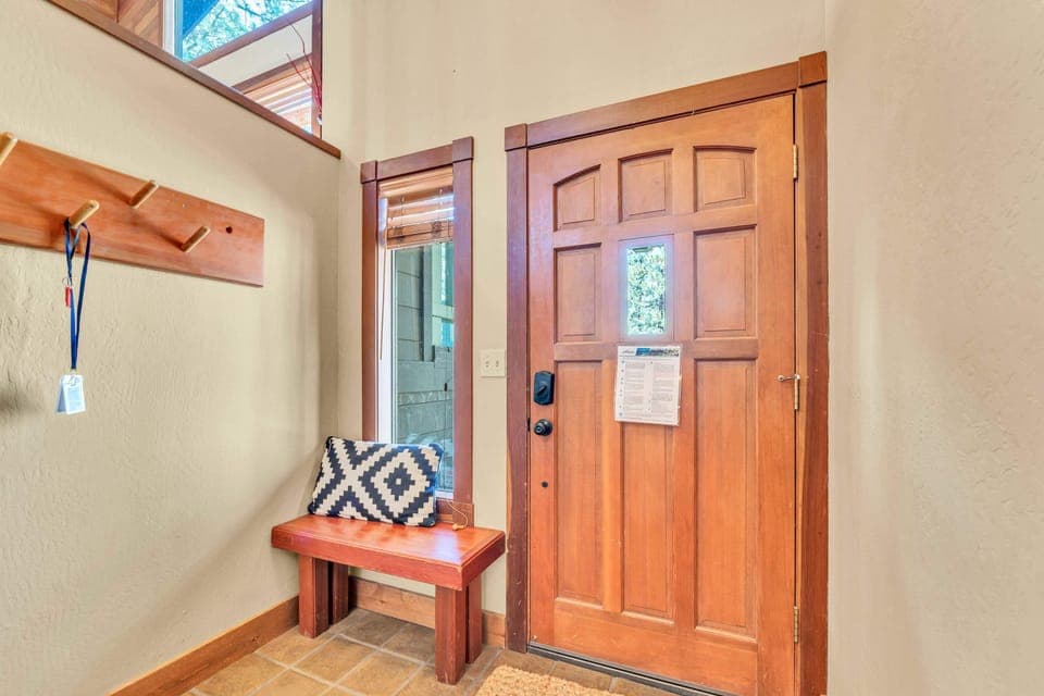Entryway: Coat hooks, storage space, access to the upper and lower floors of the home