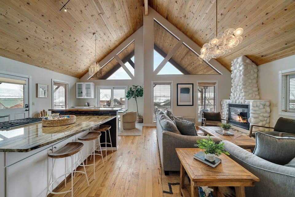 Natural light floods in through the large windows on the main level of the home.