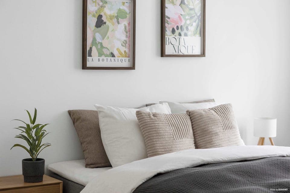 Bedroom 2 with a comfortable double-bed, built-in closets and blackout curtains to ensure you get a good nights sleep