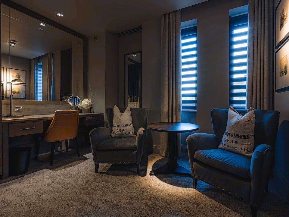 Deluxe Suite | Living area | 58-inch Smart TV with digital channels