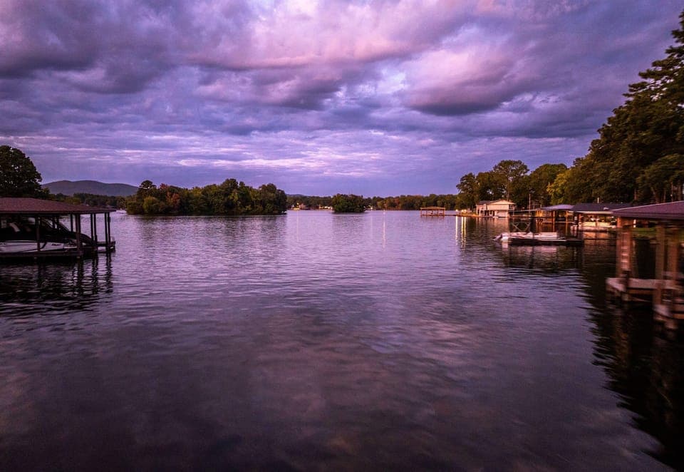 The magic of a lakefront sunset is waiting for you—relax and unwind with this stunning view as your backdrop.