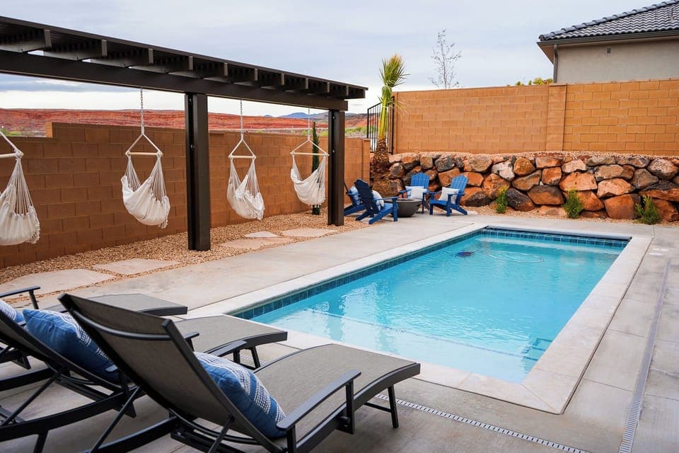 Fully fenced, private backyard with pool. 