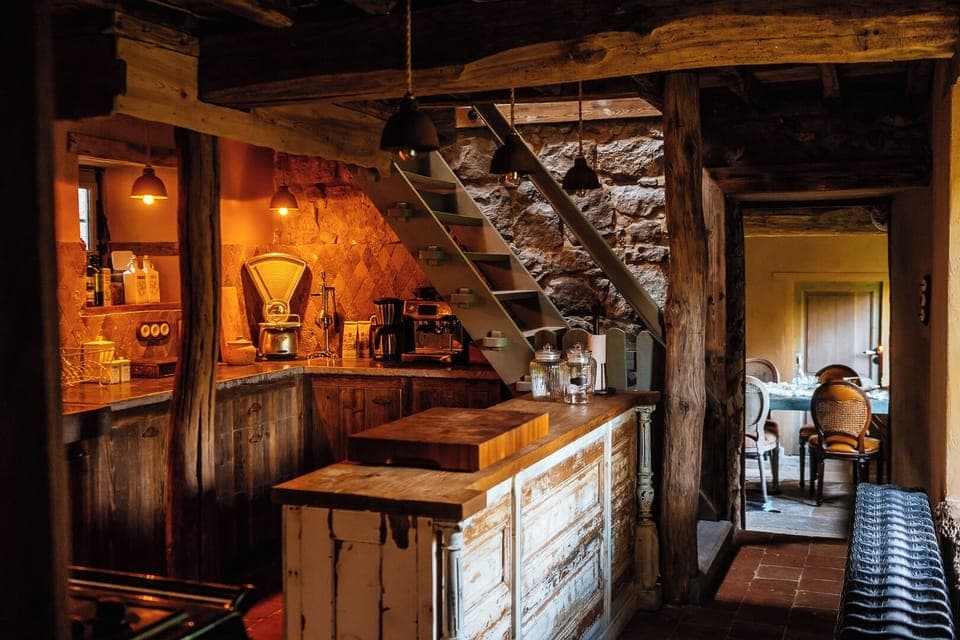 Authentic Ardennes holiday kitchen near Durbuy and Ciney. Rustic beams, stone walls and all modern comforts for your stay.