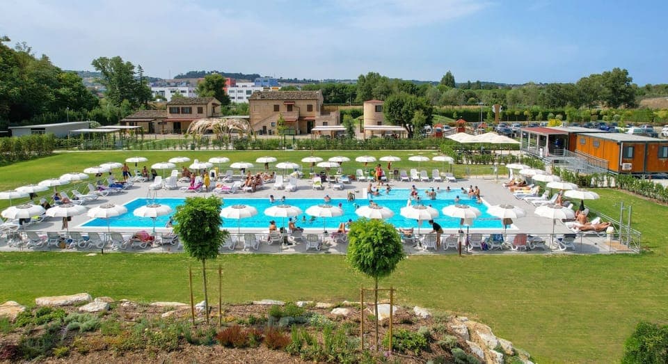 Outdoor pool, open 9:00 AM to 7:00 PM, pool umbrellas, sun loungers