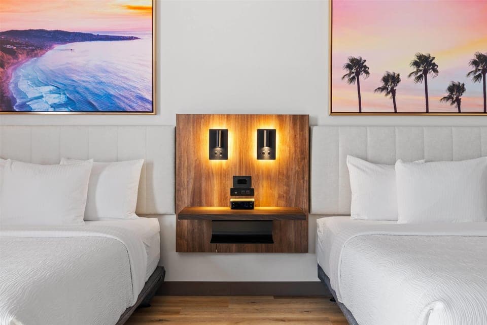 Desk, laptop workspace, iron/ironing board, travel crib