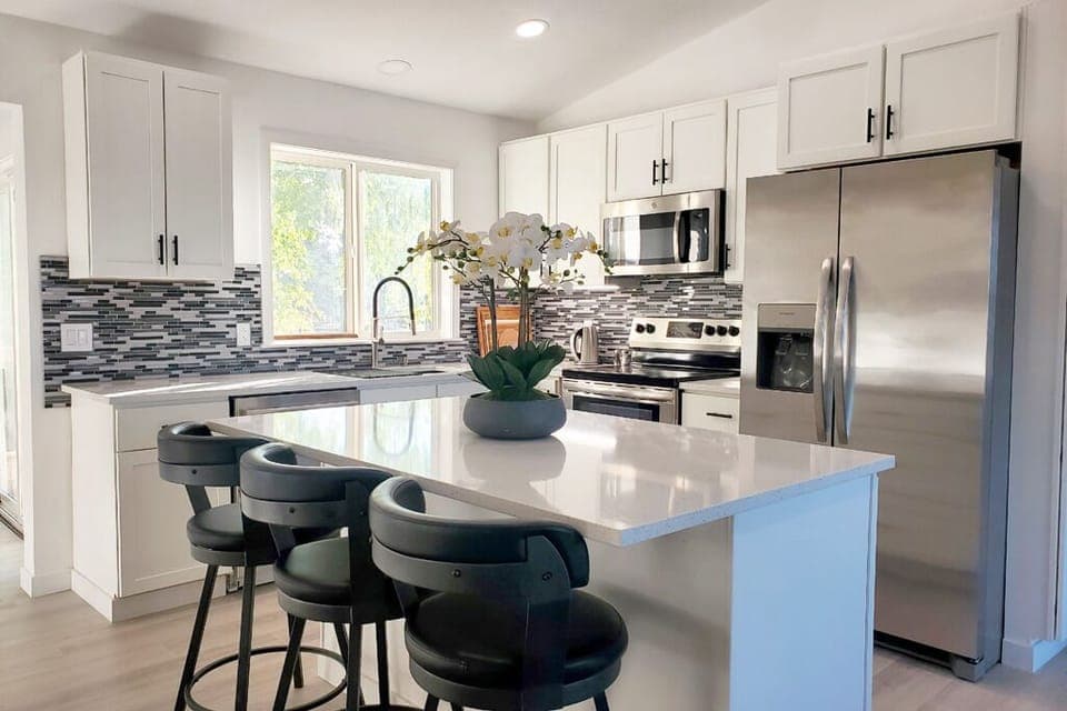 Fully stocked modern kitchen, including Keurig, coffee, and all essentials