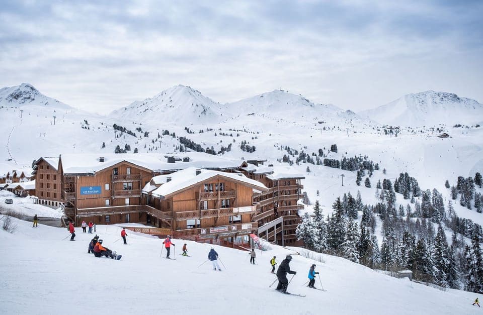 Experience the charm of this ski-in, ski-out retreat, where the serene winter landscape meets the cosy warmth of rustic mountain architecture.