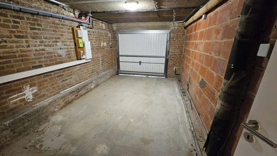 Garage dans le logement.