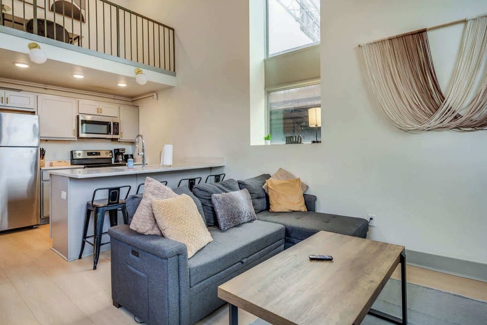 Living Room: Make yourself at home in the cozy living room with a comfy sofa and TV to unwind.