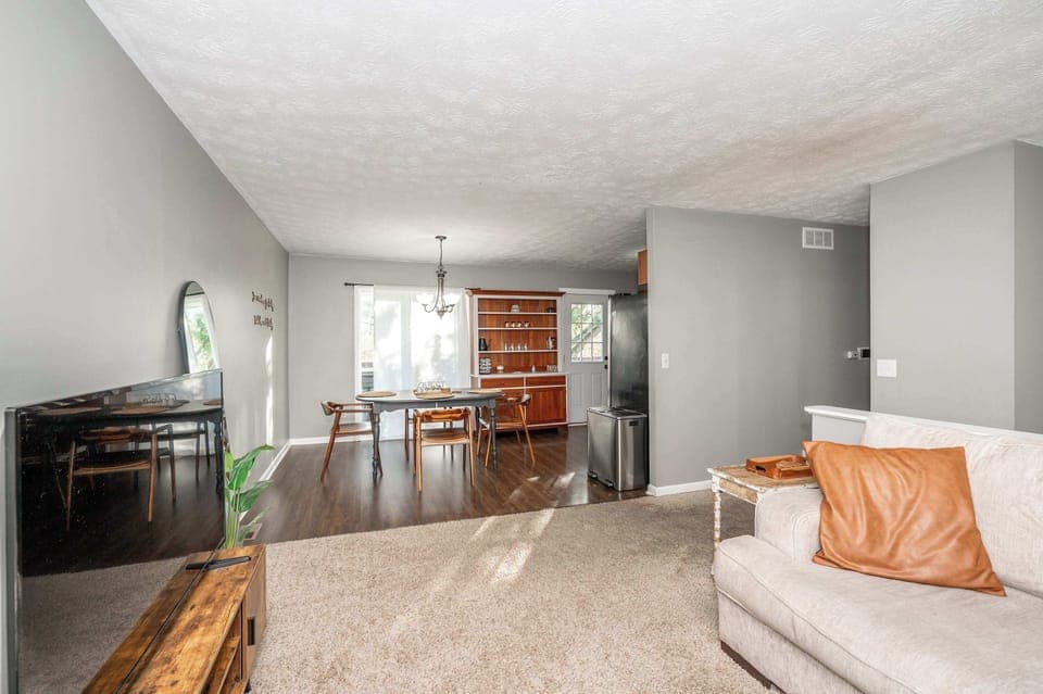 Enjoy the breezy, open layout of the upper level’s living spaces