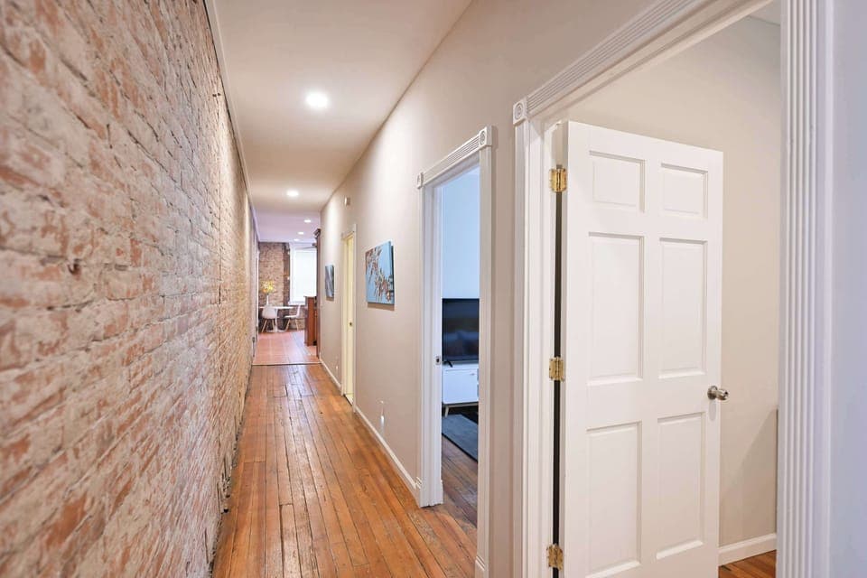 An elegant hallway offers access throughout the home