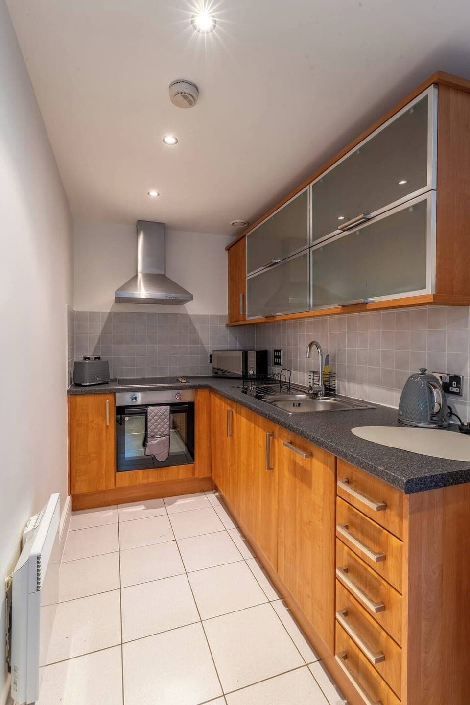 A fully fitted kitchen with everything you need to make your stay comfortable — from cooking home-made meals to enjoying a relaxed night in