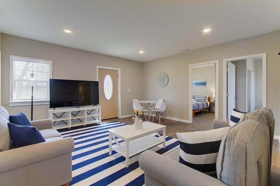 Gather, relax, and unwind in this spacious living area, perfect for movie nights and family gatherings. ️