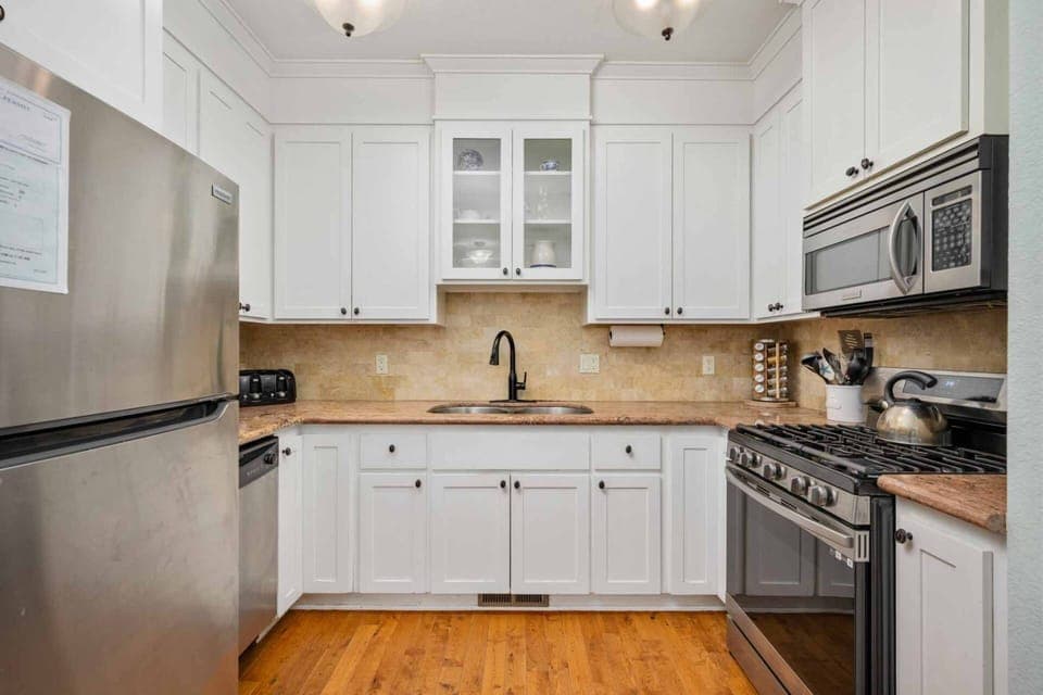 Fully stocked gourmet kitchen perfect for preparing delicious family meals.