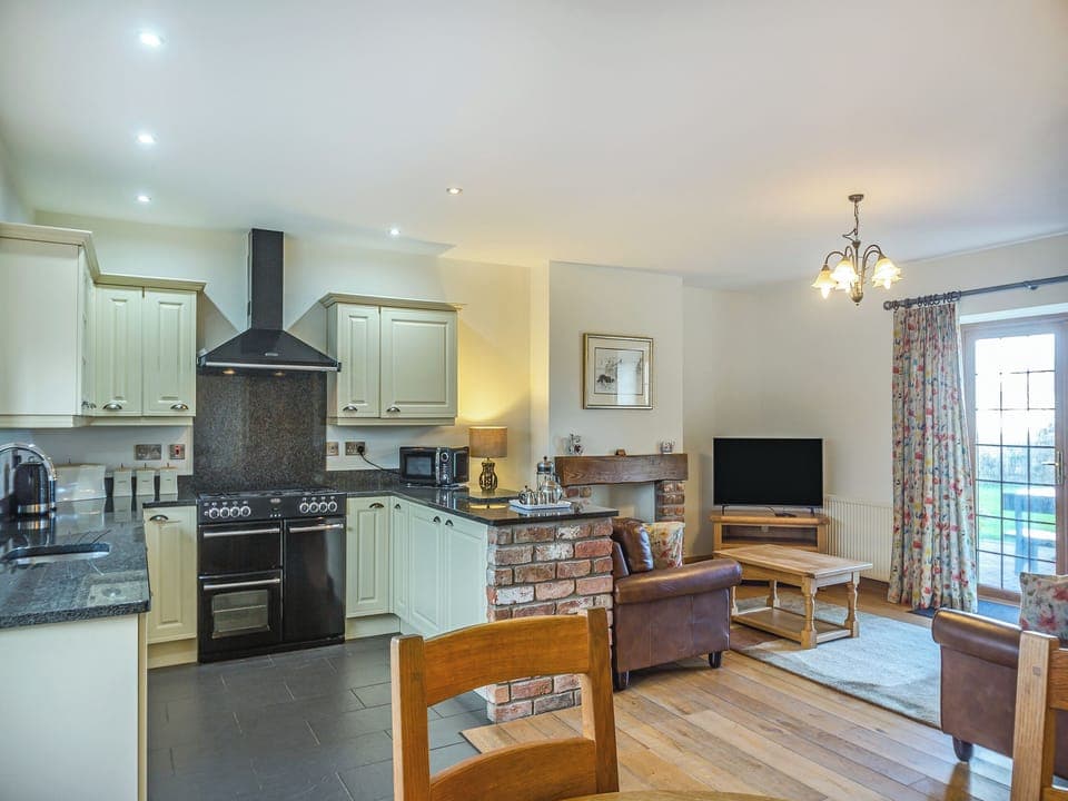 Open plan living space | Siambr - Parc Wernol Cottages, Chwilog, near Pwllheli