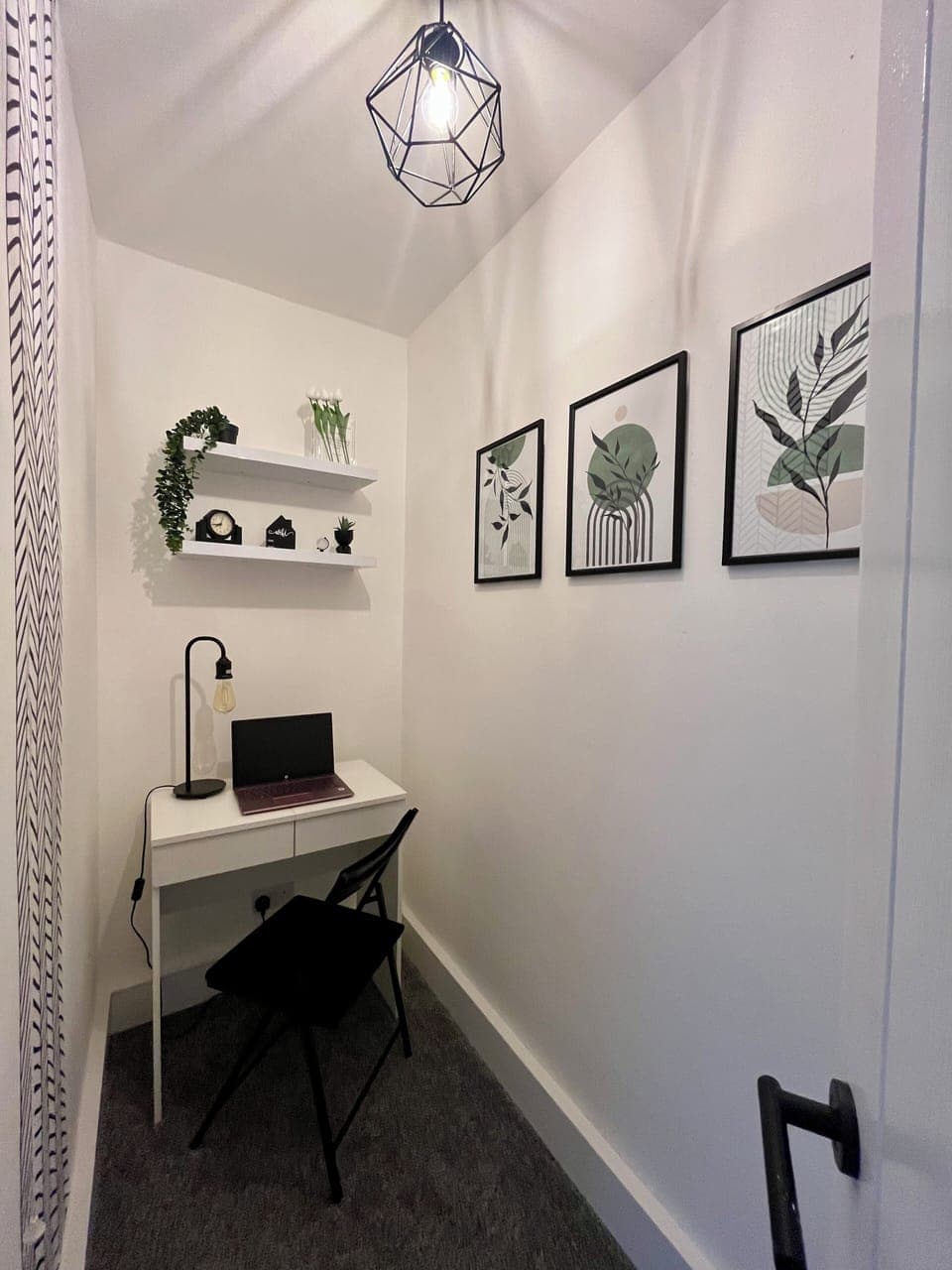 Well lit, stylish upstairs workspace.