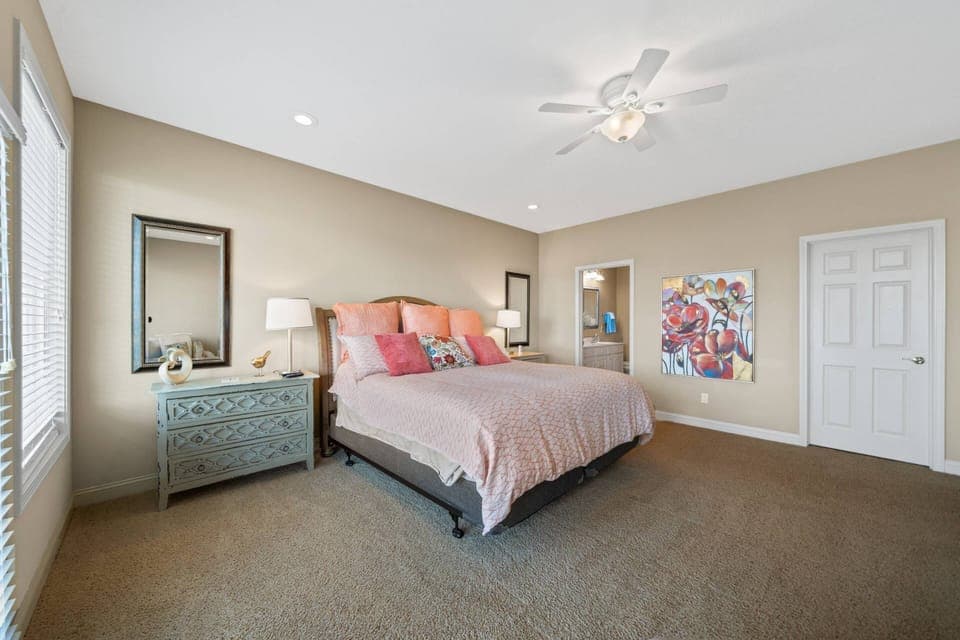 Bedroom 1 | King Bed W/ Bathroom 1 Attached | Lake Views & Patio Access