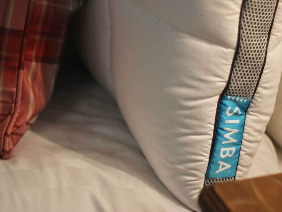 Premium bedding, memory foam beds, in-room safe, laptop workspace