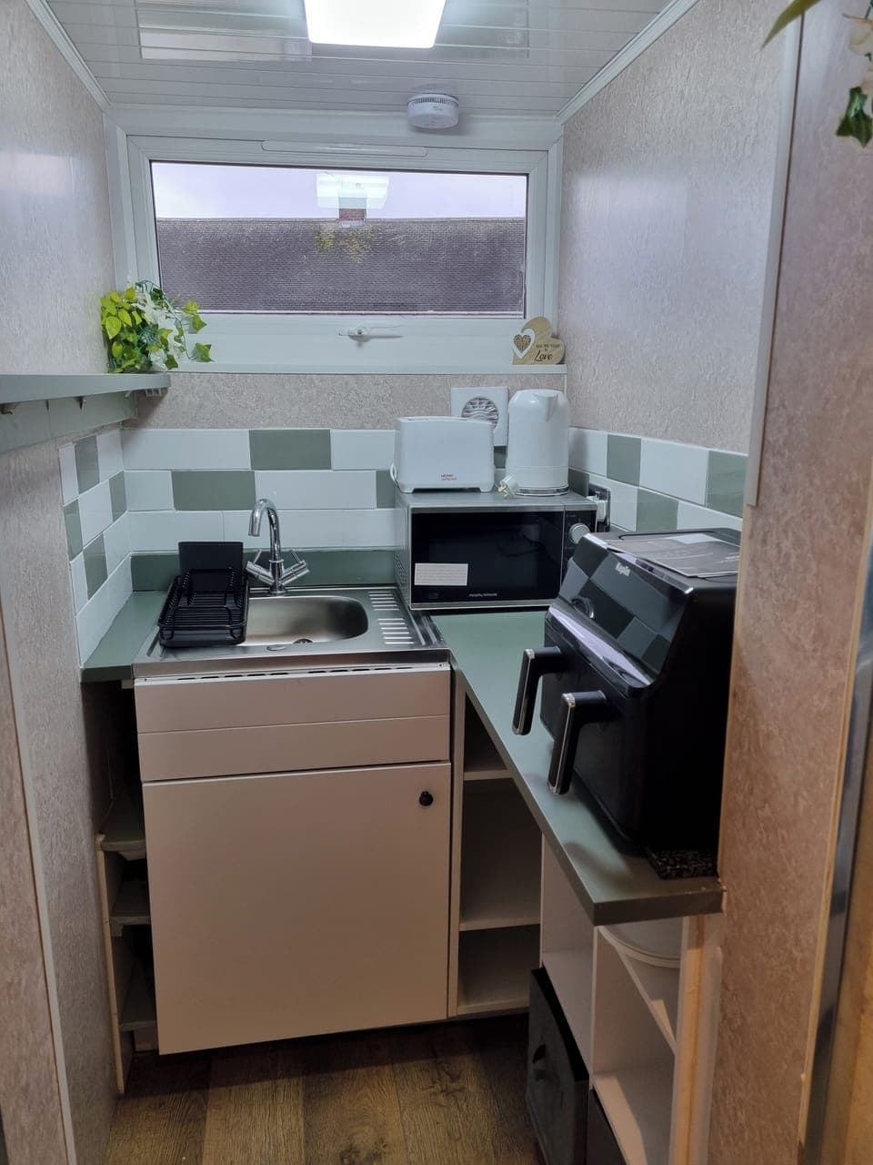 Fridge, microwave, electric kettle, toaster