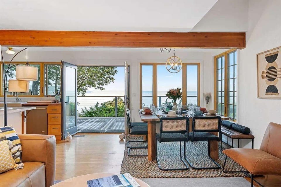 Open commons areas with large windows and double patio doors feel like you're apart of the Puget