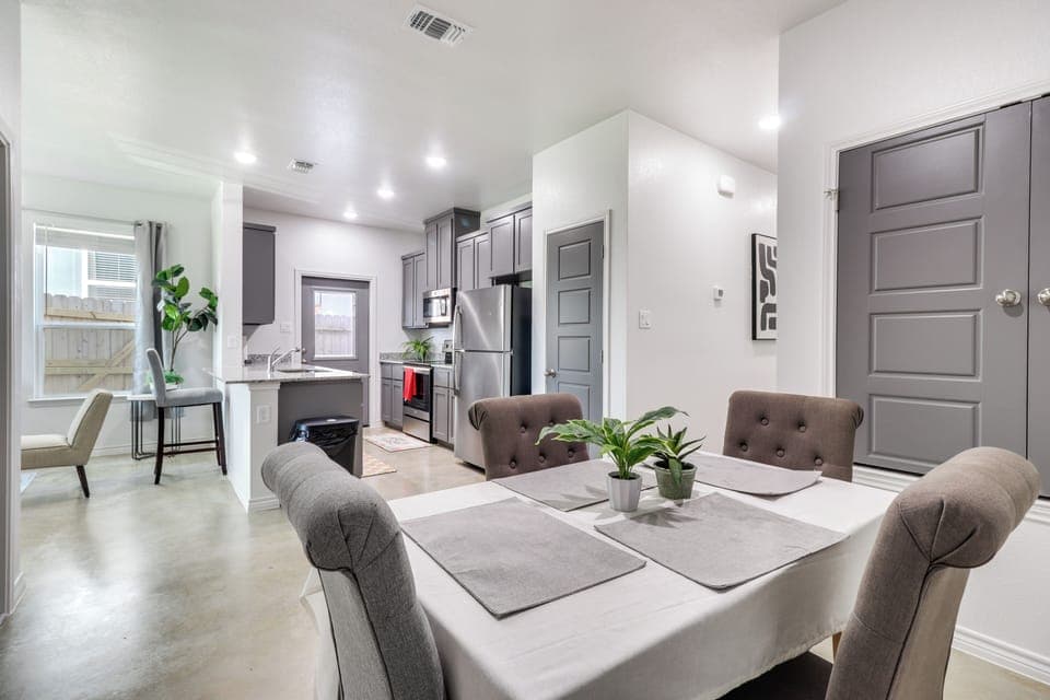 Dining Area | Dishware/Flatware | Central A/C & Heat | Single-Story Duplex Home