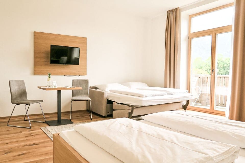 Comfort Quadruple Room, Balcony | Iron/ironing board, free cribs/infant beds, free WiFi, bed sheets