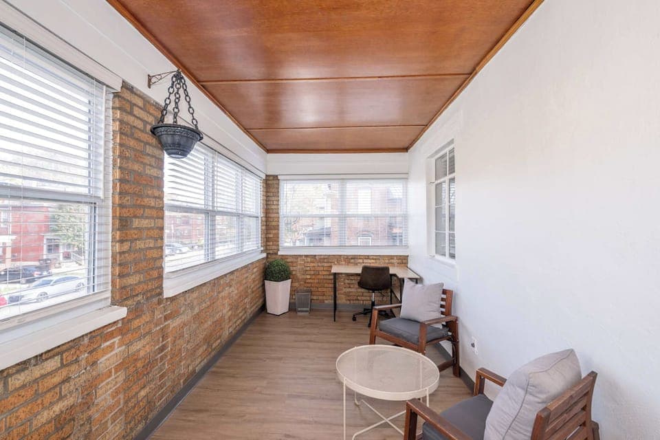 Sip morning coffee or an evening cocktail in the serene sunroom