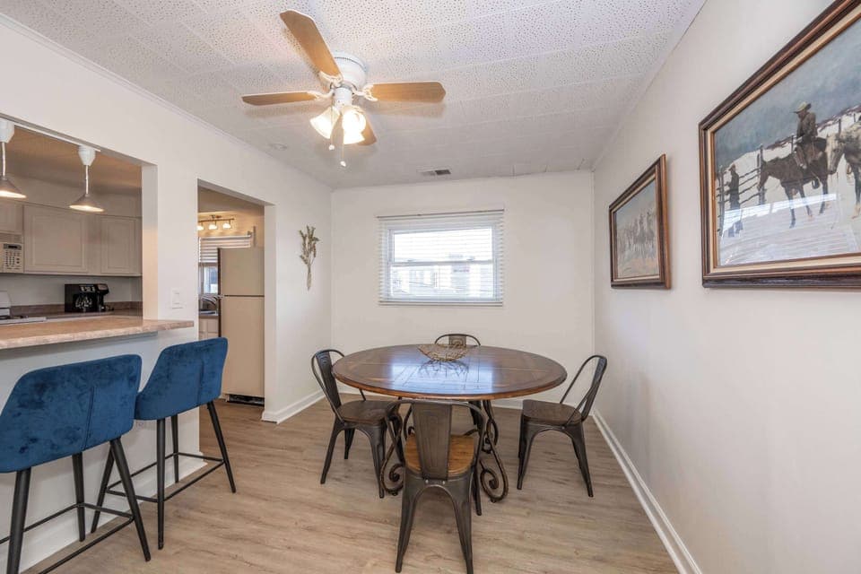 Enjoy mealtimes or an exciting game night at the dining table, seating 4