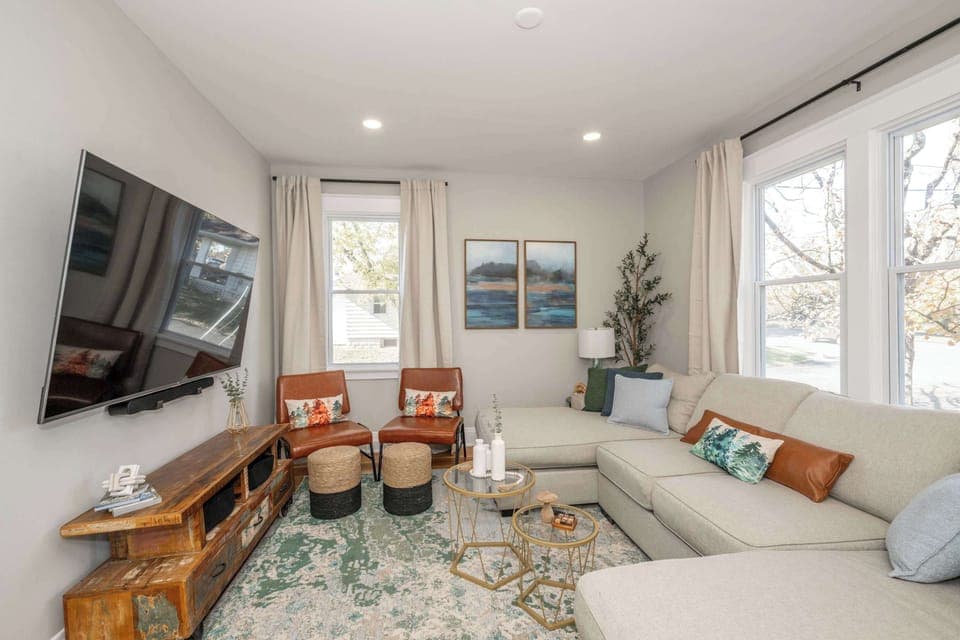 Living area with sectional seating and Smart TV